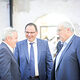 Matthias Graßmann, Martin Schöffel und Reinhard Bauer unterhalten sich.