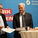 Bambergs Oberbürgermeister Andreas Starke steht neben dem Präsident der HWK für Oberfranken und hält eine Ansprache.