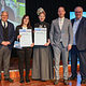 Gruppenfoto von HWK-Präsident Matthias Graßmann, Kammersiegerin Jessica Dittrich, einer Begleitperson, HWK-Hauptgeschäftsführer Reinhard Bauer