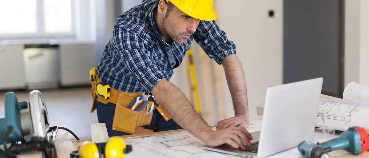 Portrait of hard working building contractor Schlagwort(e): Blueprint, Building Contractor, Built Structure, Carpenter, Computer, Connection, Construction, Construction Site, Construction Worker, Contemporary, Craftsperson, Desk, Document, Equipment, Examining, Focus, Helmet, Home Improvement, Indoors, Internet, Job, Laptop, Looking, Lumberjack Shirt, Manual Worker, Men, Mobility, Occupation, Pensive, Place of Work, Plan, Planning, Professional Occupation, Repairman, Residential Structure, Serious, Standing, Table, Technology, Tool Belt, Work Tool, Working, Yellow
